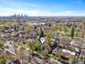 Beautiful neighborhood aerial view with the city skyline in the distance on a sunny day at 3056 W 34Th Ave, Denver, CO 80211