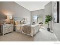 Bright primary bedroom with neutral tones, large window, comfortable furnishings, and minimalist decor at 3260 47Th St # 206A, Boulder, CO 80301