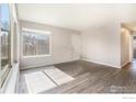 Bright living room with lots of natural light, fresh paint and new flooring at 7974 Chase Cir # 77, Arvada, CO 80003