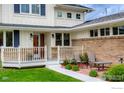Inviting front porch with seating area, perfect for relaxing and enjoying the outdoors at 873 Cypress Dr, Boulder, CO 80303