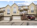 Charming townhome with private garage, deck and steps to entry and beautiful architectural windows at 1747 High Plains Ct, Superior, CO 80027