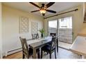 Cozy dining area with a view of the backyard, perfect for Gathering meals at 1865 Terry St # 3, Longmont, CO 80501