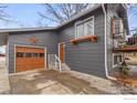 Stylish home featuring a unique star detail and an inviting front entrance at 229 Berwick Ave, Firestone, CO 80520