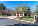 Inviting exterior with lush landscaping and a three-car garage, perfect for Gathering living at 2345 Spotswood Pl, Boulder, CO 80304