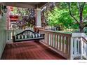 Cozy front porch with a charming porch swing, perfect for enjoying the outdoors at 4351 W 118Th Way, Westminster, CO 80031