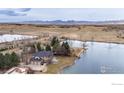 Luxury home on a large lot with waterfront access and mountain views at 10391 E Goose Haven Dr, Lafayette, CO 80026