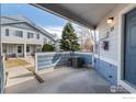 Welcoming front porch view showcasing a comfortable outdoor space with easy access to the entrance at 1419 Red Mountain Dr # 15, Longmont, CO 80504