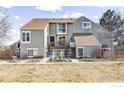 Charming two-story home featuring a cozy patio and well-maintained front yard at 3187 Redstone Ln # G, Boulder, CO 80305