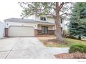 Charming two-story home featuring a two-car garage and a welcoming front porch at 3762 W 99Th Ave, Westminster, CO 80031