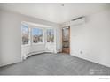 Bright bedroom with bay window and access to outdoor area for a refreshing retreat at 2254 Spruce St # A, Boulder, CO 80302