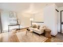 Bright living room featuring hardwood floors and modern decor, perfect for relaxing and entertaining at 3035 Oneal Pkwy # V-11, Boulder, CO 80301