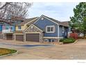 The property shows an exterior with a stone garage and driveway at 3076 W 112Th Ct # F, Westminster, CO 80031