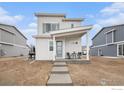 Charming two-story home featuring modern design, inviting porch and low maintenance landscaping at 317 Pyramid Peak St, Berthoud, CO 80513