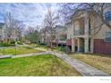 Charming condo complex with manicured green spaces and inviting pedestrian walkways at 550 Mohawk Dr # 67, Boulder, CO 80303