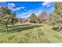 Expansive, well-maintained backyard, perfect for outdoor activities and relaxation at 7975 Anchor Dr, Longmont, CO 80504