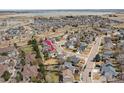 An aerial view shows the neighborhood, nearby lake, and the home's location on a tree-lined street at 1508 Aspenwood Ln, Longmont, CO 80504