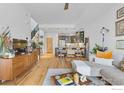 Spacious living room with hardwood floors, modern furniture, and an open floor plan at 5318 5Th St # E, Boulder, CO 80304