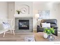 Living room features a cozy fireplace, comfortable seating, and elegant decor, creating a welcoming atmosphere at 1788 Alpine Dr, Erie, CO 80516