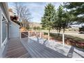 Wide back deck showcasing railings and view of exterior scenery at 595 Northstar Ct, Boulder, CO 80304