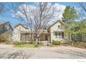 Attractive two-story home with a inviting porch, showcasing the home's curb appeal at 2607 Thornbird Pl, Boulder, CO 80304
