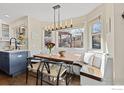 A charming dining nook with built-in seating offers a cozy space for meals at 501 W Linden St, Louisville, CO 80027