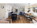 Spacious kitchen with a large island, stainless steel appliances, and an eat-in kitchen at 501 W Linden St, Louisville, CO 80027