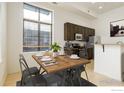 Cozy kitchen and dining area with stainless steel appliances and modern fixtures at 1200 Yarmouth Ave # 239, Boulder, CO 80304