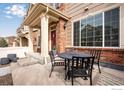 Inviting front patio features comfortable seating and a welcoming entrance to the home at 16022 W 63Rd Ln # A, Arvada, CO 80403