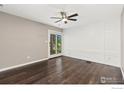 Bedroom features a ceiling fan and access to the outdoors at 1607 Cottonwood Dr # 14, Louisville, CO 80027