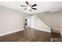 Open living room with hardwood floors and staircase at 1607 Cottonwood Dr # 14, Louisville, CO 80027