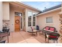 Relax on this private patio featuring outdoor seating, decorative water feature, and views of the surrounding community at 2714 Calmante Pl, Superior, CO 80027