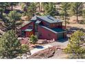 Wonderful mountain home on a large lot with a two car garage and mature trees at 8543 Middle Fork Rd, Boulder, CO 80302