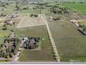 Aerial shot of expansive property with lush green fields at 2610 W County Road 4, Berthoud, CO 80513