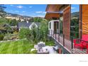 Balcony view showcasing the home's patio, grill, and outdoor seating area at 3633 Broadway St, Boulder, CO 80304