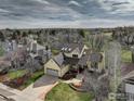 A bird's eye view of a home with a spacious yard and a serene natural backdrop at 4462 Wellington Rd, Boulder, CO 80301