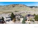Aerial view of a home with mountain views in a residential community at 4655 7Th St, Boulder, CO 80304