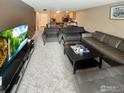 Inviting living room featuring a comfortable gray sofa and modern decor at 805 29Th St # 204, Boulder, CO 80303