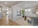 A cozy office space with neutral tones, carpeted floors, and ample natural light, perfect for remote work at 4211 Sandstone Dr, Mead, CO 80504