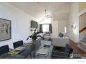 Open floor plan with living room, dining area and stairs at 3342 W 114Th Pl, Westminster, CO 80031