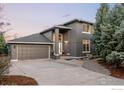 Stunning two-story home with a three car garage and beautiful landscaping, perfect for curb appeal at 4156 15Th St, Boulder, CO 80304