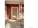 Cozy front porch with decorative doormat and inviting entryway at 3488 Molly Cir, Broomfield, CO 80023