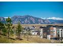 Scenic view of the community with stunning mountain backdrop and clear blue skies at 438 Meridian Ln, Superior, CO 80027