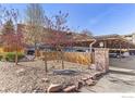 Shady Creek parking area with covered parking and well-maintained landscaping at 2227 Canyon Blvd # 306A, Boulder, CO 80302