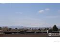 Scenic mountain view from the rooftop showcasing blue skies and lush greenery at 2660 E Otero Pl # 7, Centennial, CO 80122