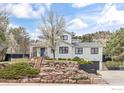 Attractive two-story house showcasing professionally landscaped front yard and direct garage access at 2847 4Th St, Boulder, CO 80304
