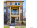 Two-story townhouse featuring a private balcony perfect for relaxing outdoors at 658 Casper Dr, Lafayette, CO 80026