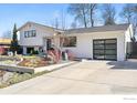 Stylish home featuring a modern garage door and inviting driveway at 1670 Linden Ave, Boulder, CO 80304