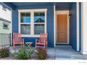Inviting front porch with rocking chairs, perfect for relaxing and enjoying the outdoors at 364 Shawnee Ln, Superior, CO 80027