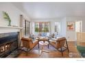 Comfortable living room with fireplace, stylish seating, and lots of natural light at 4819 White Rock Cir # C, Boulder, CO 80301