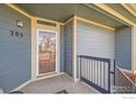 Private entryway featuring unit number and secure access at 804 Summer Hawk Dr # 3205, Longmont, CO 80504